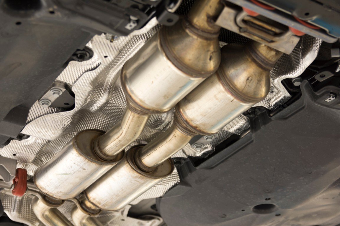 Catalytic converters mounted in an exhaust system viewed from underneath a vehicle