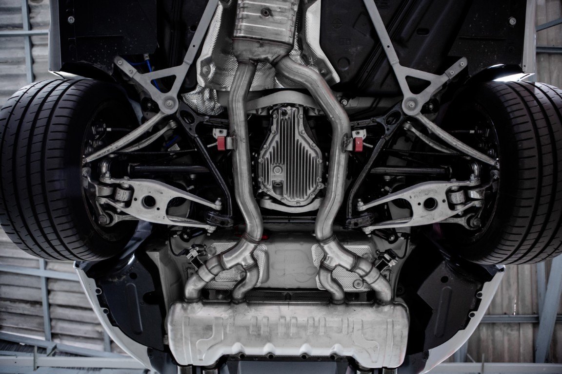 Exhaust system and suspension viewed from under a vehicle